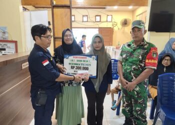 Babinsa Koramil 07/Tambelan Dampingi dan Kawal Penyaluran BLT di Desa Kukup