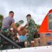 Satgas Gulbencal Yonif 122/TS Kodam l/BB Drop Logistik Jalur Udara ke Dusun Parombunan, Tapteng