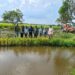 Babinsa Koramil 02/TL laksanakan panen padi perdana dengan Combine Harvester 110 Harfia