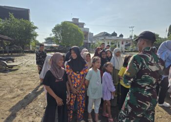 TNI dan Unsyiah Gelar Trauma Healing untuk Anak Korban Banjir di Pidie Jaya