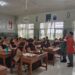 Babinsa Koramil 01/Rasanae Dampingi Pembagian Makan Bergizi Gratis 2.192 Pelajar Kelurahan Tanjung