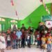 Satgas Pamtas Yonarhanud 2 Kostrad Bagikan Buku Rohani di Wilayah Perbatasan