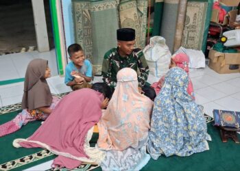Prajurit Yonif TP 901/SG Laksanakan Trauma Healing Bagi Anak-Anak Korban Bencana di Huta Godang