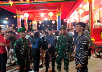 Perkuat Toleransi, Personel Koramil 02/TL Gelar Patroli Pengamanan Perayaan Imlek di Tanjung Leidong