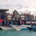 Di Tengah Laut, Nelayan Aru Sambut Pembagian Paket Sembako yang Digelar Lanal Aru bersama KRl Dorang-874 dalam Operasi Trisila-26