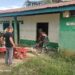 Babinsa dan Warga Kompak Bersihkan Fasilitas Umum di Simpang Ulim