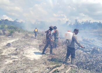 AKSI SIGAP PRAJURIT TNI AL TANGANI KARHUTLA DI WILAYAH PERBATASAN