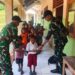Satgas Yonarhanud 2 Kostrad Bagikan Makanan Bergizi untuk Siswa Perbatasan