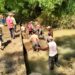 Antisipasi Banjir, Babinsa Koramil Bakung Ajak Warga Kerja Bakti Bersihkan Sungai