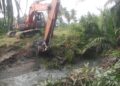 Cegah Banjir,Satgas TMMD 128 Langkat Normalisasi Parit di Wilayah Gebang