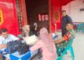 Babinsa Titipapan Monitoring Kegiatan Posyandu Anak Balita dan Lansia di Kelurahan Titipapan