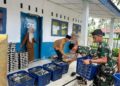 Satgas TMMD 128 Langkat,Ikut Bantu Menyalurkan MBG ke SMK Swasta Gebang