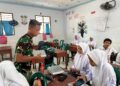Satgas TMMD 128 Langkat,Ikut Bantu Menyalurkan MBG ke SMK Swasta Gebang