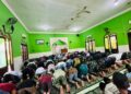Sujud di Pesisir Rawa: Ketika Seragam Merunduk Khusyuk Memohon Kelancaran TMMD 128