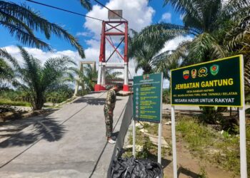 Kodim 0212/TS Tuntaskan Perbaikan Jembatan Gantung Rambin Pulo Goya di Tapsel