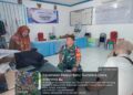 Komsos Babinsa Serda Darmono Aruan Bersama Perangkat Desa Tingkatkan Kerjasama di Wilayah Binaan