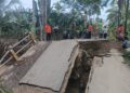 Setelah Roboh Diterjang Banjir, Jembatan Desa Somanggal Parmonangan Kini Dibangun Kembali oleh Kodim 0212/TS