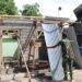 Satgas TMMD Kodim 0110/Abdya Bersama Warga Semenisasi Lantai RTLH di Gunung Cut
