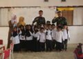 Tinggalkan Sejenak Pekerjaan Fisik, Personel TMMD Pilih Temui Anak-anak TK, Ada Apa?