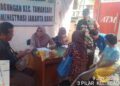 Babinsa Koramil 01/Taman Sari Monitoring Warga Kelurahan Keagungan Terima Bantuan Pangan Nasional Bulog 2026