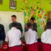 Yonarmed 12 Kostrad Berikan Motivasi dan Dukungan kepada Siswa Lulusan SD di Perbatasan