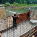 Kodim 0103/Aceh Utara Pacu Rehabilitasi Jembatan Perintis Desa Saweuk, Kini Masuki Tahap Pengecoran Angkur