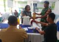Babinsa Kodim 0201/PB Monitoring Penyaluran Beras Bantuan Pangan Nasional