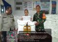 Babinsa Desa Patumbak -II Komsos Bersama Perangkat Desa dan Masyarakat dalam Pembagian Bantuan Pangan pemerintah Pusat (APBN)
