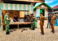 Babinsa Koramil 07/Julok Ajak Warga Aktifkan Siskamling Demi Wujudkan Desa Aman dan Tertib