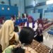 Donat Daun Kelor Buatan Mahasiswa UNIMED Jadi Makanan Anti Stunting di Desa Sidourib