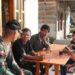 Diplomasi Warung Kopi,Cara Satgas TMMD 129 Kodim 0210/TU Jinakkan Hoaks dan Redam Curiga