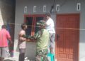 Prada Febri Manalu Perbaiki Instalas Listrik Rumah Warga di Lokasi TMMD Ke 129 Kodim 0210/TU