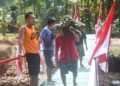 Jembatan Gantung di Desa Hou Rampung, Perkuat Akses Warga Nias Lewat Program Bakti TNI AD Untuk Rakyat