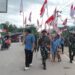 Satgas Yonarmed 13 Kibarkan Merah Putih Sepanjang 4 Kilometer di Perbatasan Sambut HUT Ke-81 Kemerdekaan RI