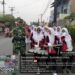 Babinsa Wilayah Patumbak Kawal Jalan Sehat dalam Rangka Peringatan HUT RI Ke-81 di Wilayah Binaan.