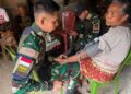 Wujud Kepedulian Kepada Warga, Satgas Pamtas Yonarhanud 2 Kostrad Berikan Pelayanan Kesehatan Keliling