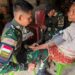 Wujud Kepedulian Kepada Warga, Satgas Pamtas Yonarhanud 2 Kostrad Berikan Pelayanan Kesehatan Keliling