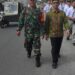 Babinsa Desa Tandem Hilir 1 Laksanakan Pengamanan Kegiatan Gerak Jalan
