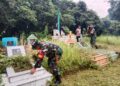 Anggota Koramil 0201-16/TM Laksanakan Karya Bakti Gotong Royong di Makam Pahlawan Tanjung Morawa