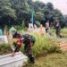 Anggota Koramil 0201-16/TM Laksanakan Karya Bakti Gotong Royong di Makam Pahlawan Tanjung Morawa