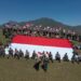 Semangat Kebangsaan di Perbatasan, Satgas Pamtas Yonarhanud 2 Kostrad Kibarkan Bendera Raksasa di Bukit Bijaelsunan