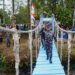 Hujan Tak Halangi Pangkoarmada RI Resmikan Jembatan Kori dan Gelar Bakti Sosial di Negeri Tawiri
