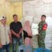 Wujud Kepedulian Rakyat, Babinsa Koramil 02/TL Kawal Penyaluran Bantuan Pangan Bulog di Desa Air Hitam