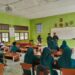 Babinsa Dampingi Penyaluran MBG di SMAN di Babahrot