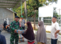 Peduli Gizi Masyarakat, Babinsa Koramil 23/Langsa Timur Dampingi Penyaluran Bantuan Ikan Segar