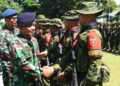 DANSATHANTAI KODAERAL X HADIRI UPACARA PENERIMAAN SATGAS PAMTAS RI-PNG YONIF 726/TAMALATEA
