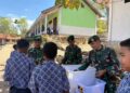 Merawat Semangat Belajar, Satgas Pamtas Yonarhanud 2 Kostrad Bagikan Nasi Kotak Gratis kepada Pelajar