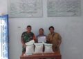 BABINSA KORAMIL 0201-14/PB DAMPINGI PEMBAGIAN BANTUAN PANGAN BERAS
