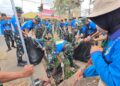 Kompak dan Bersinergi! TNI-Polri Gelar Karya Bakti di Pasar Wamanggu dalam Rangka HUT TNI ke-81