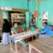 Lewat Ngopi Bareng, Babinsa Koramil 07/Salak Bangun Komunikasi dan Pantau Wilayah